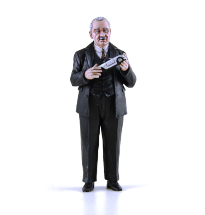 Ferdinand Porsche holding a model car Figurine
